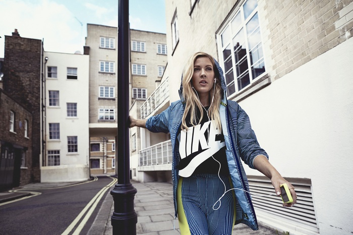 Ellie Goulding wearing Nike in a city street