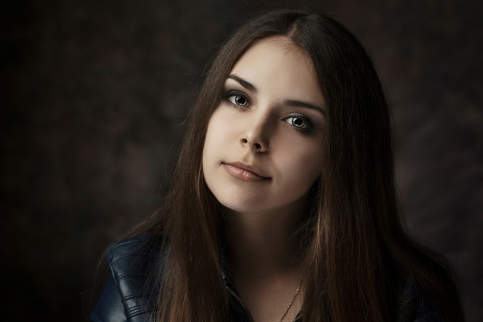 Portrait of a Young Woman with Long Dark Hair
