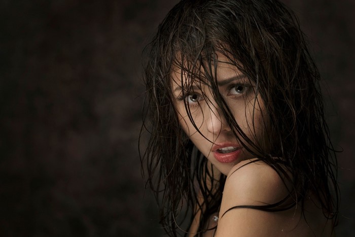 Woman with wet hair looking at the camera