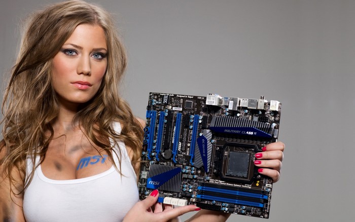 Woman holding an MSI motherboard