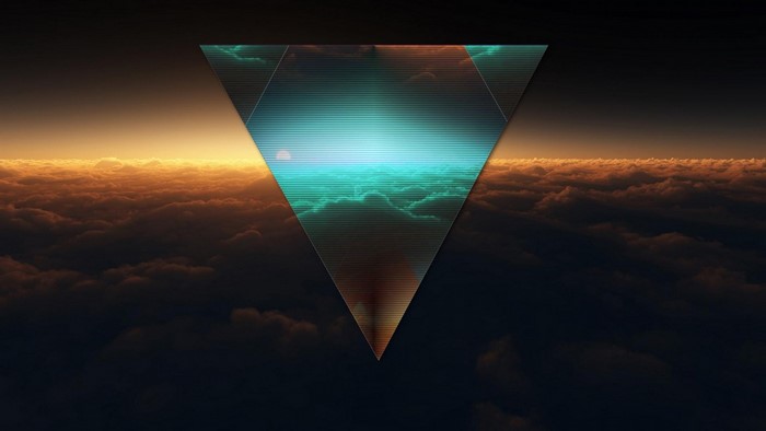 Abstract triangle over clouds at sunset