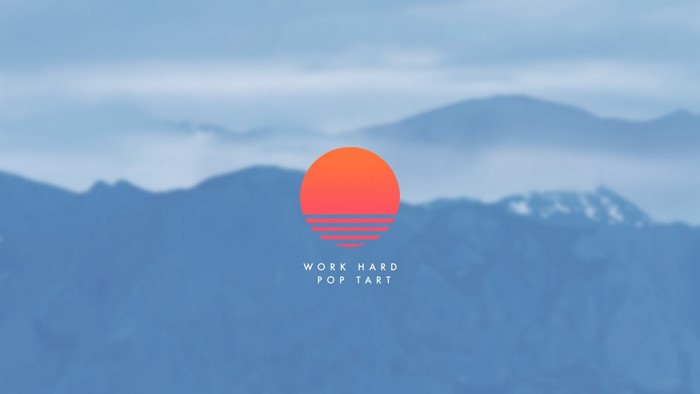 Mountains and a stylized sun with text