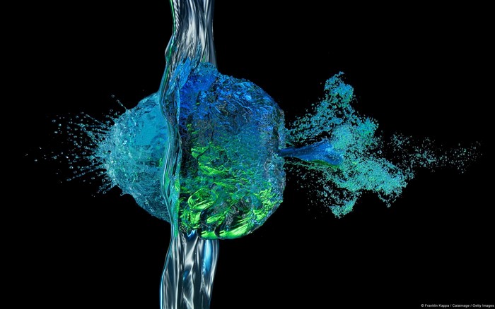 Water splashing and colliding with a blue and green object