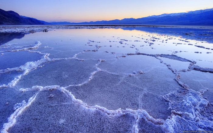Salt flats and mountains at sunset