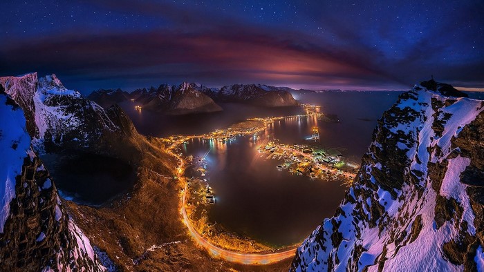Lofoten, Norway: Snowy Mountains and Coastal Town at Night