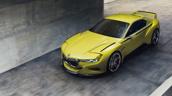 Yellow BMW 3.0 CSL concept car on a road