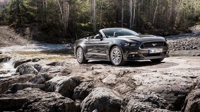 Ford Mustang Convertible on rocky riverbank