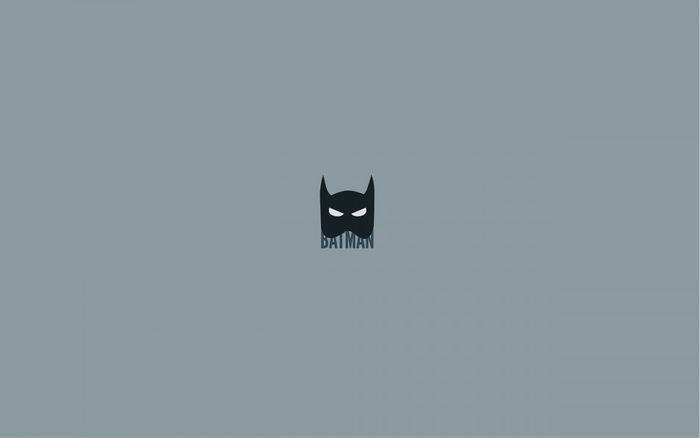 Batman logo on a gray background
