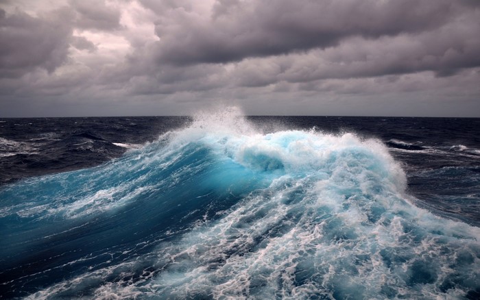 Stormy ocean with a large crashing wave