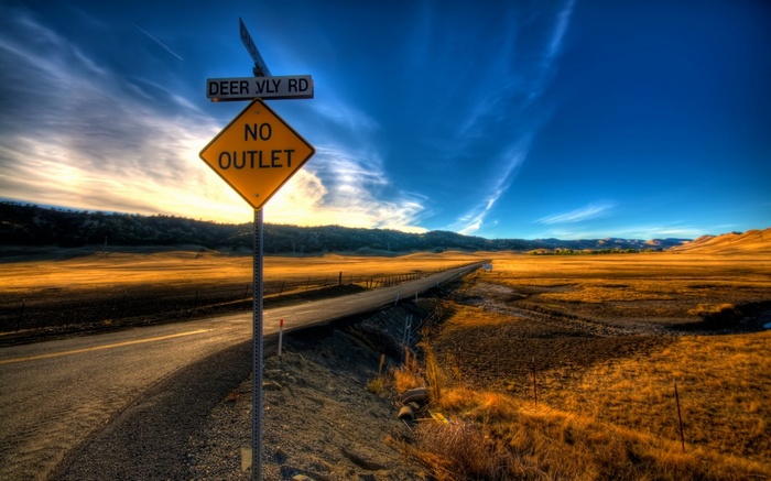 Road sign for Deer Vly Rd No Outlet in a rural landscape