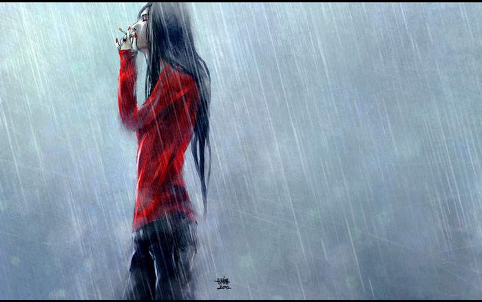 Woman in red smoking in the rain