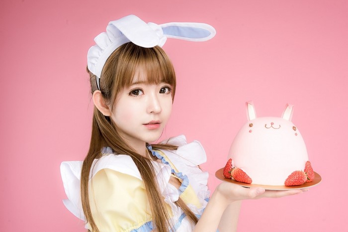 Yurisa Chan in a maid costume holding a bunny cake