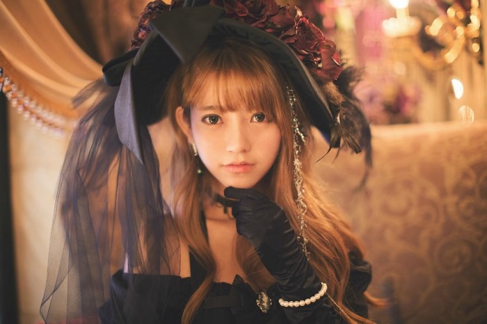 Elegant Gothic Woman in Vintage Style Hat