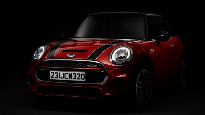 Red Mini Cooper JCW with racing stripes