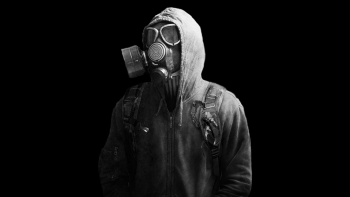 Person in gas mask and hood