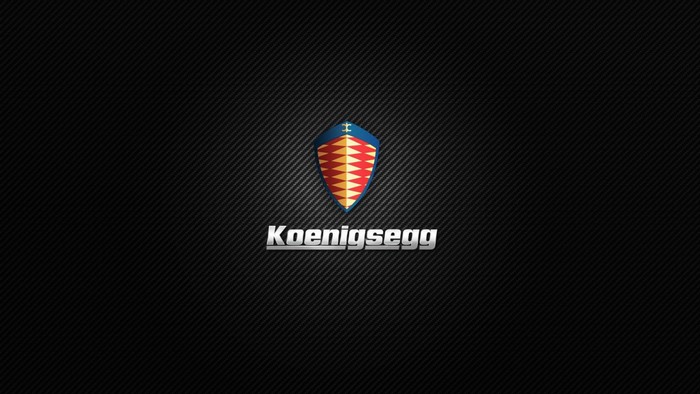 Koenigsegg logo on carbon fiber background