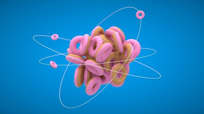 Donuts orbiting like atoms on a blue background