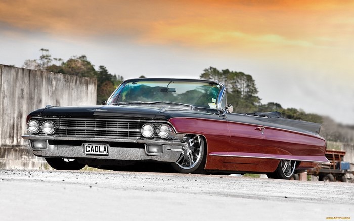 Red and black Cadillac convertible lowrider
