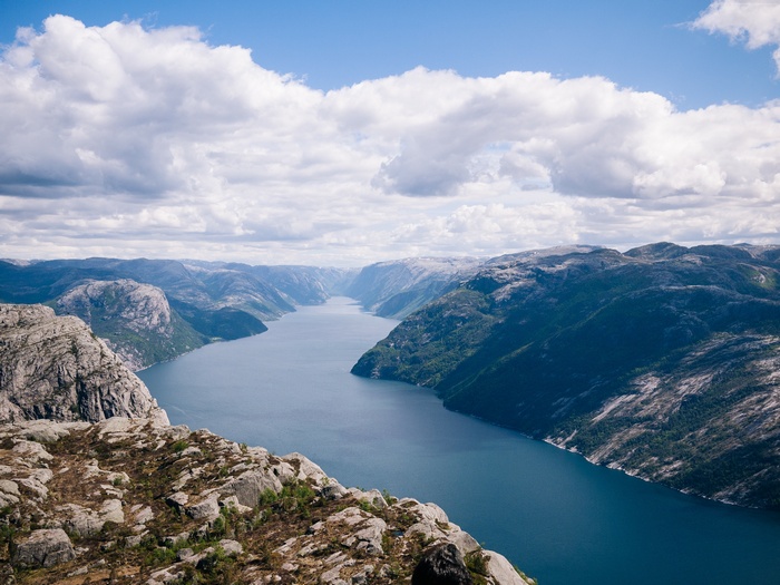 Majestic Fjord in Norway with Mountains and Clouds