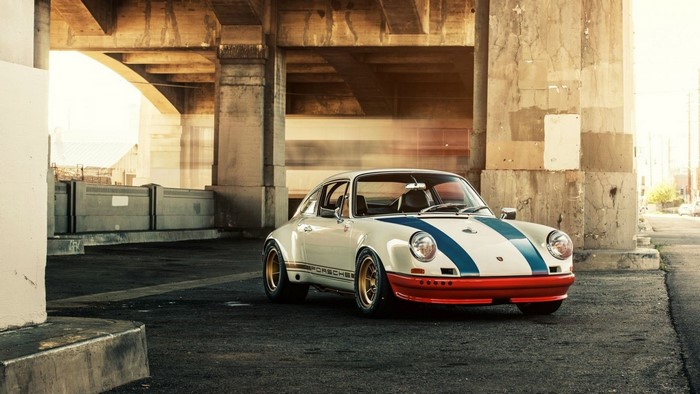 White Porsche 911 with Blue Stripes and Red Accents