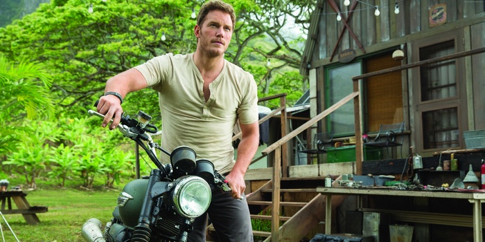 Chris Pratt on a motorcycle in Jurassic World