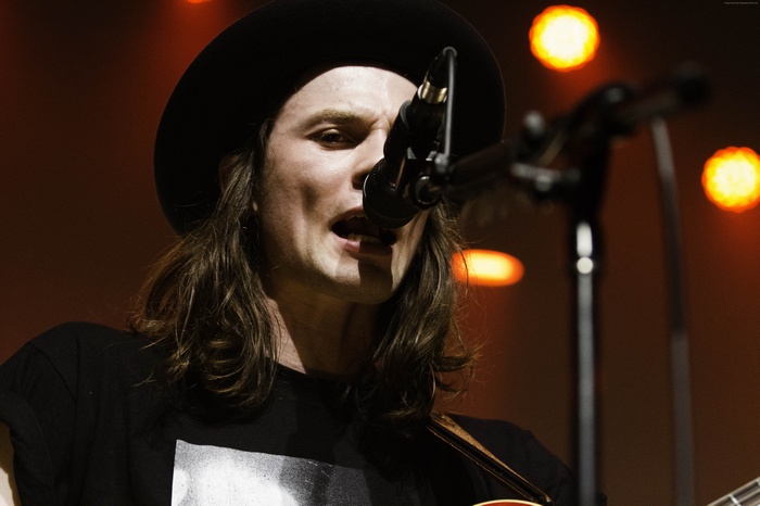 Singer James Bay performing on stage