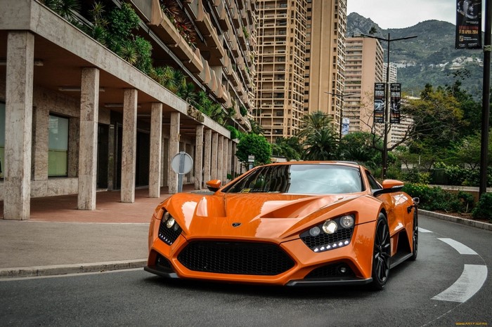 Orange Zenvo ST1 supercar parked on a street