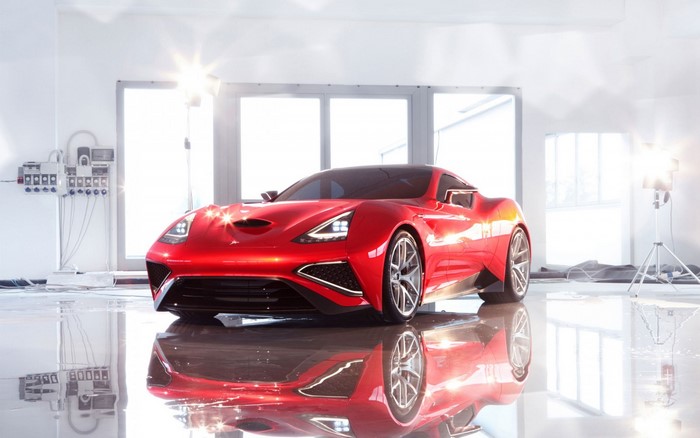 Red sports car in a studio setting