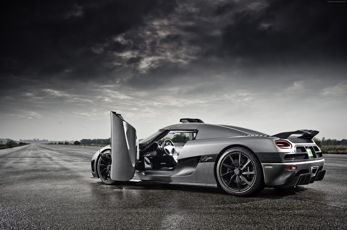 Koenigsegg Agera R hypercar on wet asphalt