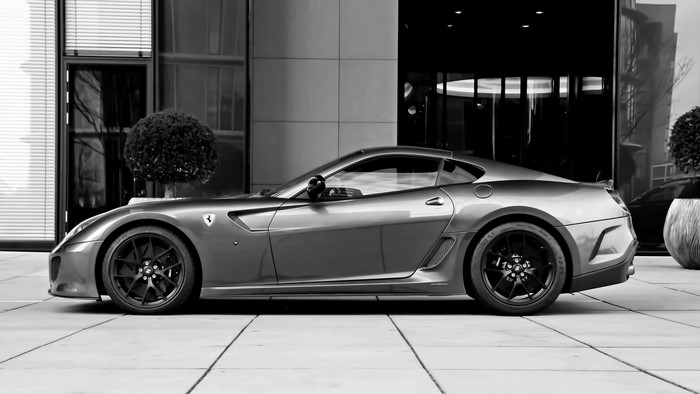 Ferrari 599 GTB Fiorano parked outside a modern building