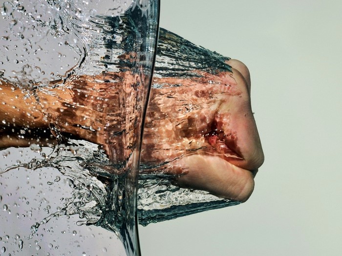Fist punching through water