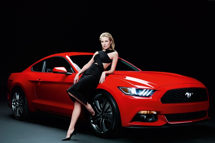 Sienna Miller with a red Ford Mustang coupe