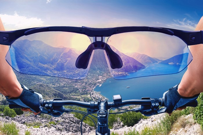 Mountain biking through sunglasses with scenic view