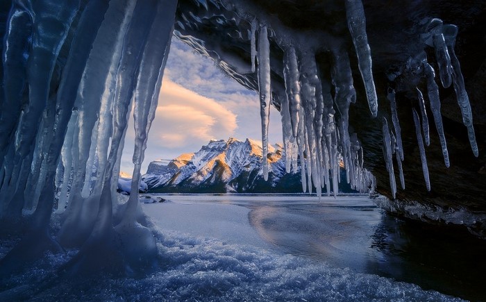 Ice cave overlooking Banff National Park mountains