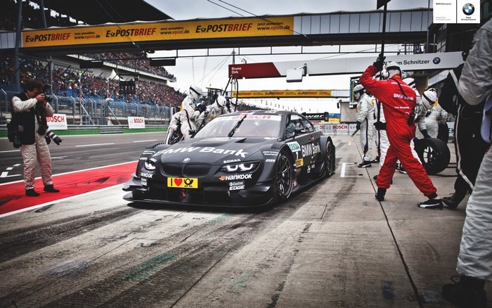 BMW Bank race car pit stop at a race track