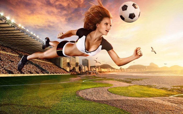 Woman playing soccer in a stadium