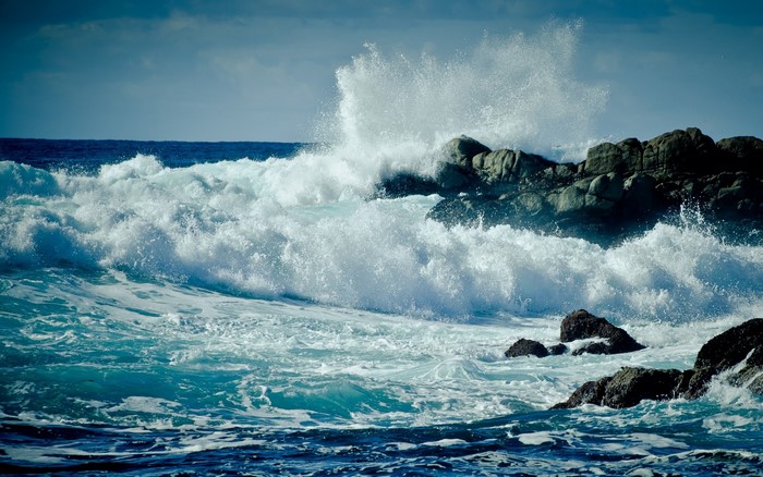 Waves crashing against rocks on the coast