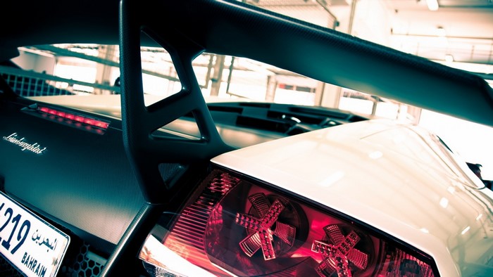 Lamborghini car rear with spoiler and taillight