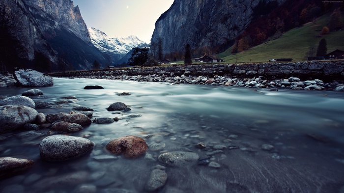 River flowing through mountains in Switzerland 4K
