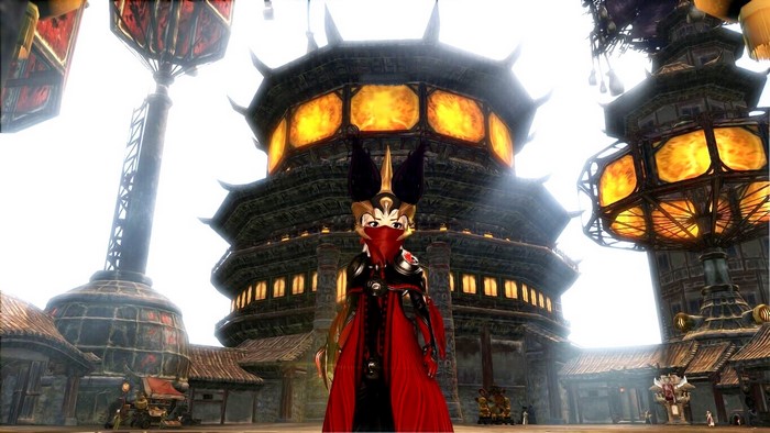 Character in red cloak in front of Asian-style temple