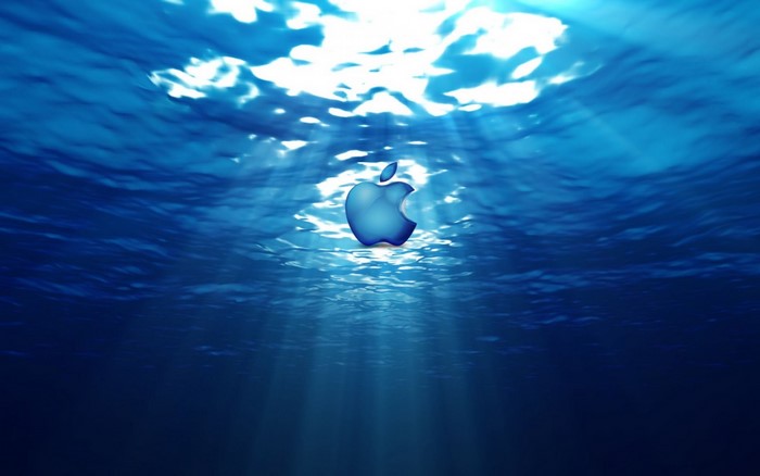 Apple logo underwater with sun rays