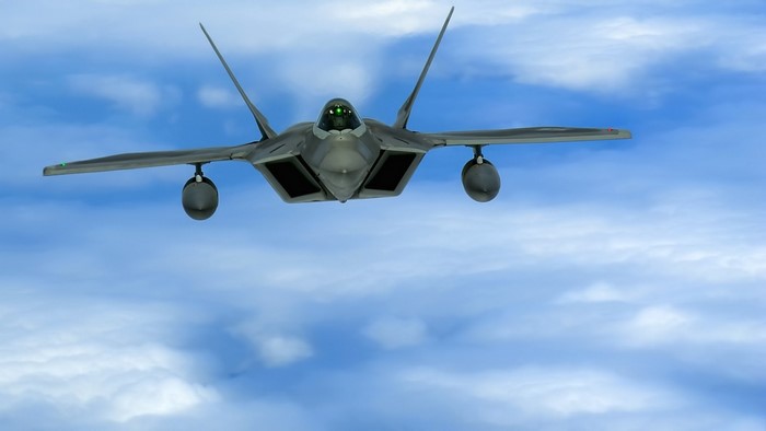 F-22 Raptor fighter jet flying in the sky