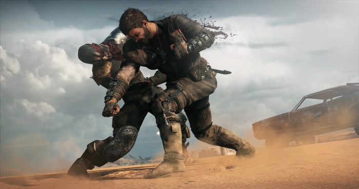 Max from Mad Max fighting in a desert