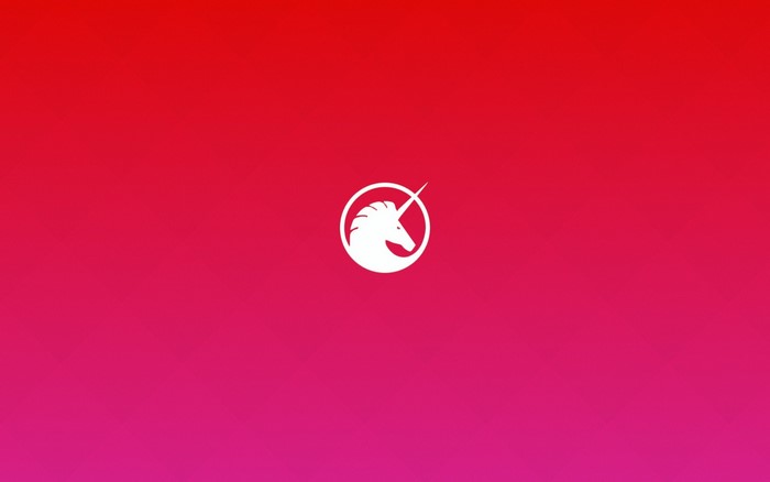 White unicorn logo on a red and pink gradient background