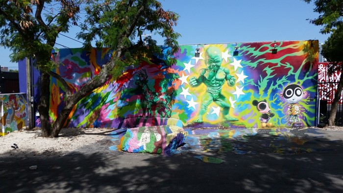Graffiti mural with alien and cartoon characters in Miami