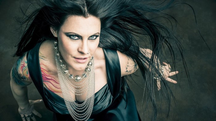 Floor Jansen from Nightwish with tattoos and jewelry