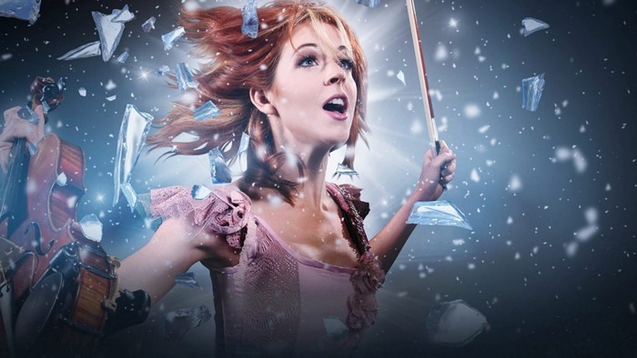 Lindsey Stirling with violin and shattered glass