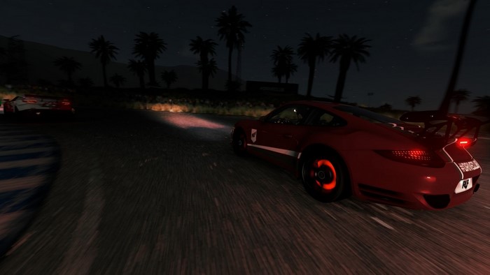 Red Porsche 911 GT3 RS racing at night in Driveclub