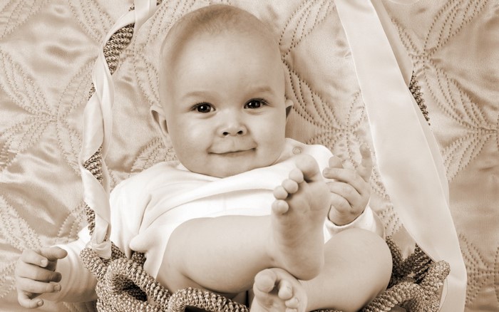 Sepia portrait of a smiling baby