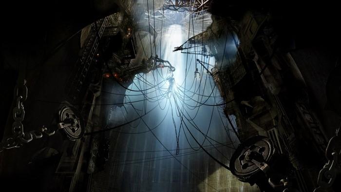 Dark industrial cavern with hanging wires and machinery